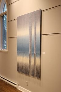 image of woven panel in gallery